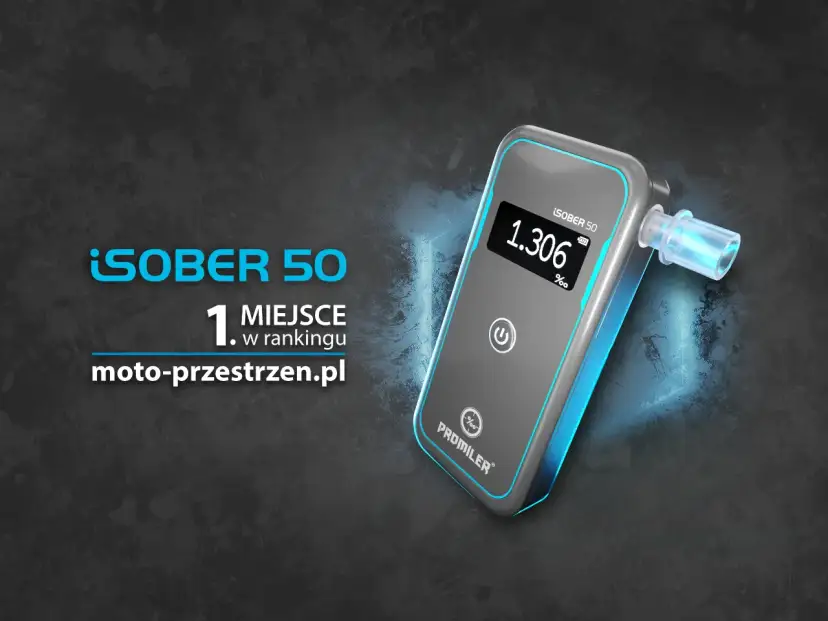 Cyfrowy alkomat Promiler iSober 50 z wyświetlaczem pokazującym 1.306‰ na tle grafiki.
