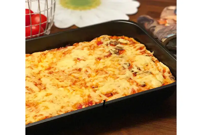 Jak zrobić, żeby ciasto na pizzę było miękkie i puszyste?