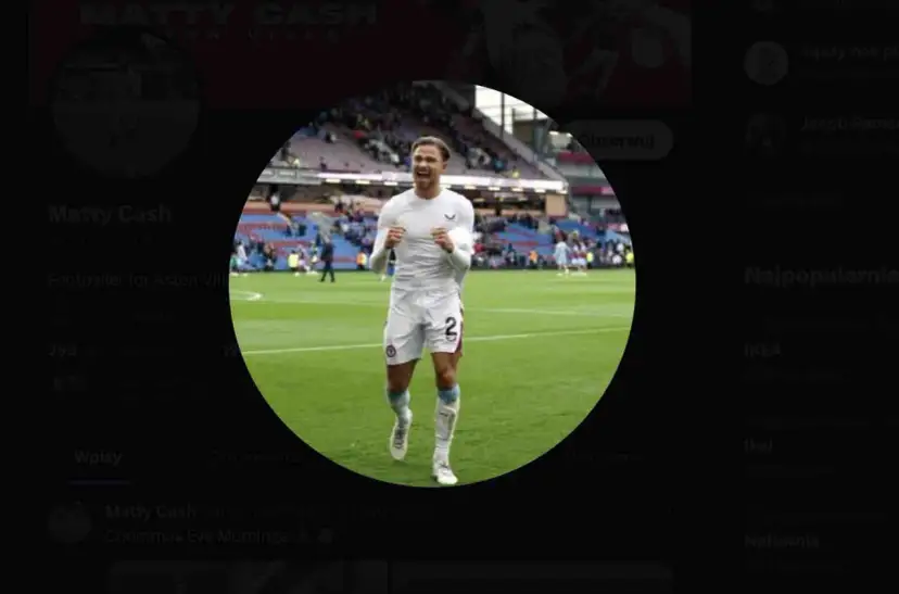 Matty Cash, piłkarz Aston Villi, świętuje na boisku. Jego wzrost jest imponujący, co widać na zdjęciu.