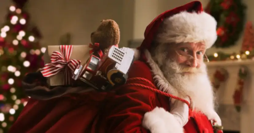 Święty Mikołaj z workiem pełnym zabawek, jak w legendzie o świętym mikołaju dla dzieci.