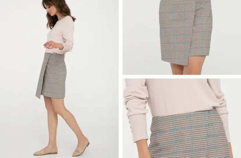 Kratka na spódniczce to ponadczasowy trend. Modelka prezentuje stylową, asymetryczną spódniczkę w kratkę, która z pewnością jest modna.