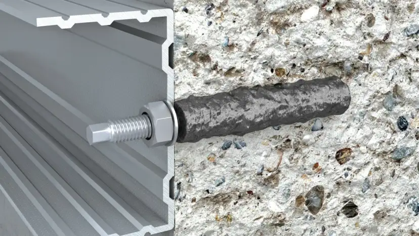 Przekrój kotwy z regulacją w betonie i profilu aluminiowym.